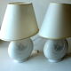 2 bedside lamps made of white ceramic with floral motifs and fabric lampshades, vintage from the 70s