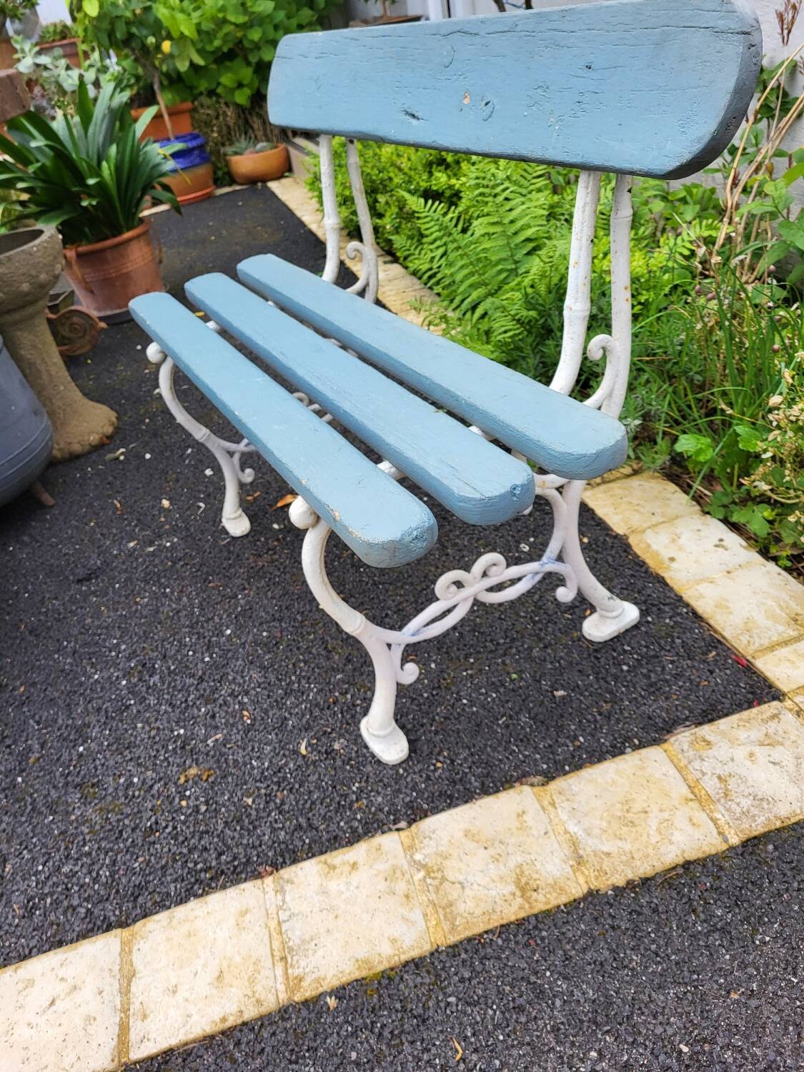 2-seater cast iron garden bench from the 19th century