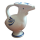 Zoomorphic vase in the shape of a bird made of Biot ceramic.