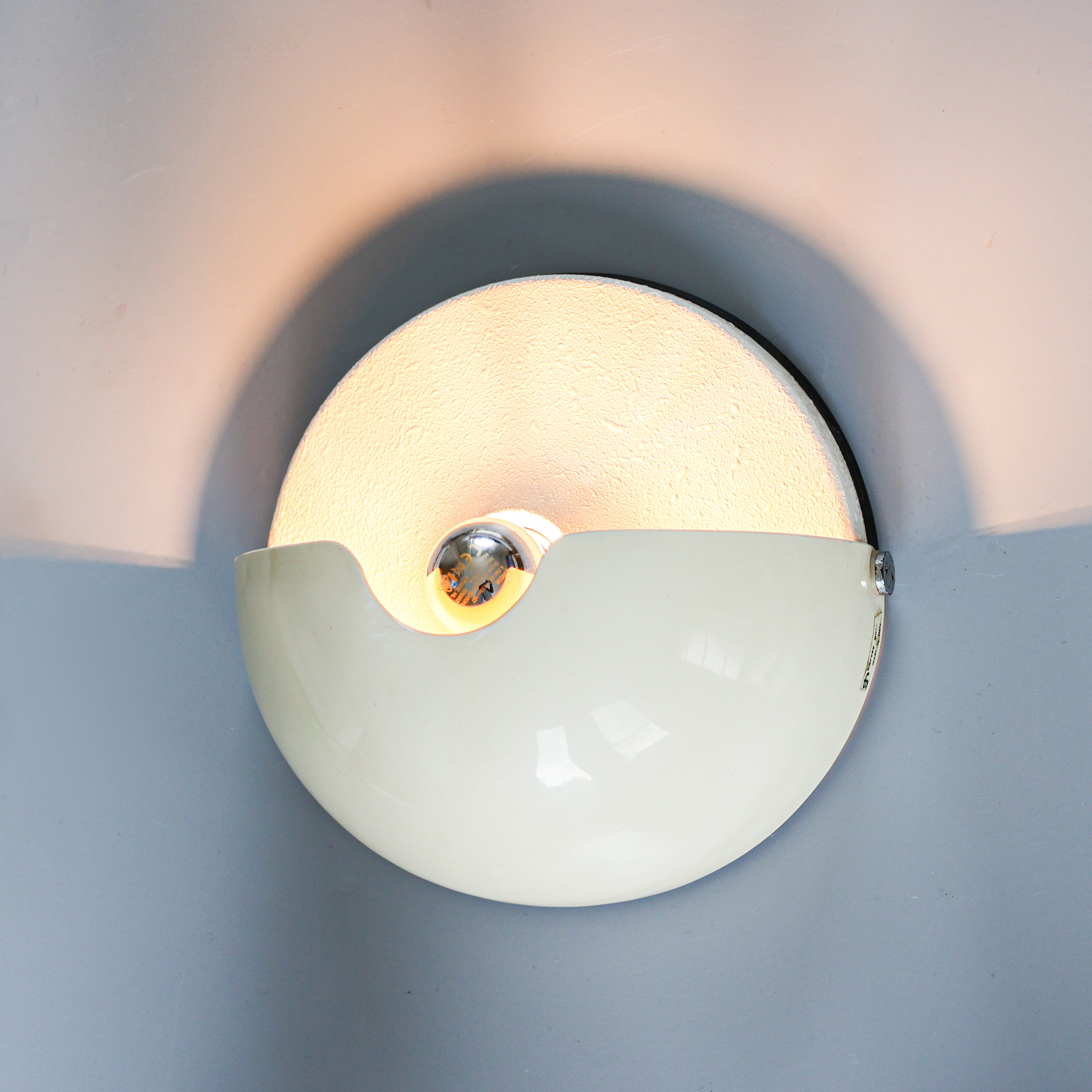 Vintage Harvey Guzzini 'Mezzanotte' sconce, 1970s.