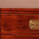 Commode bombée en acajou et incrustations, circa 1800