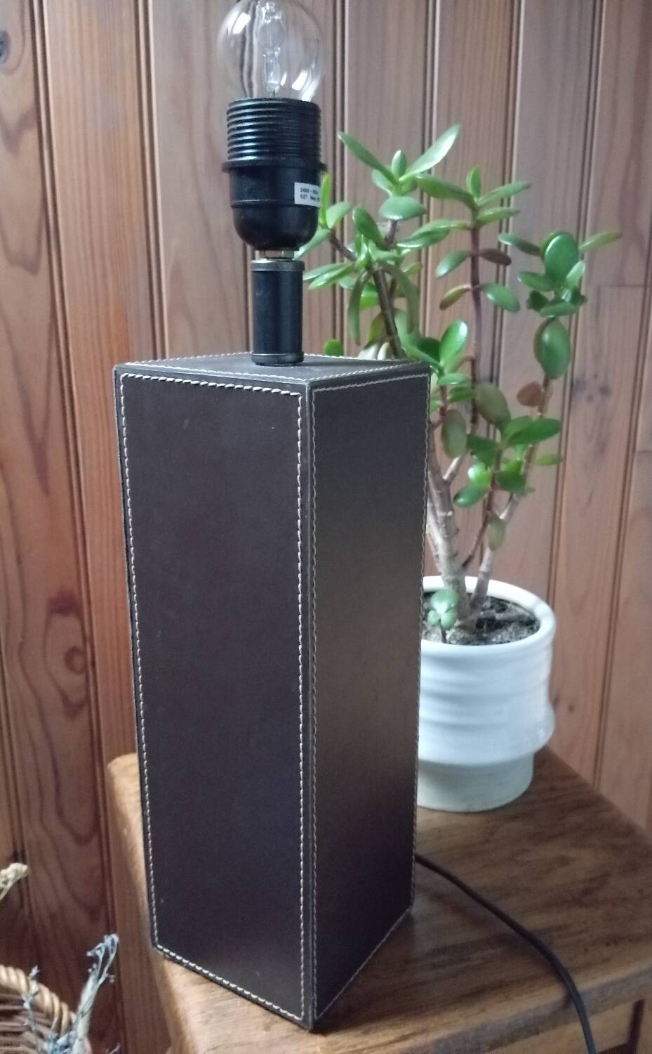 Tall cubic brown leather lamp, light gray fabric lampshade