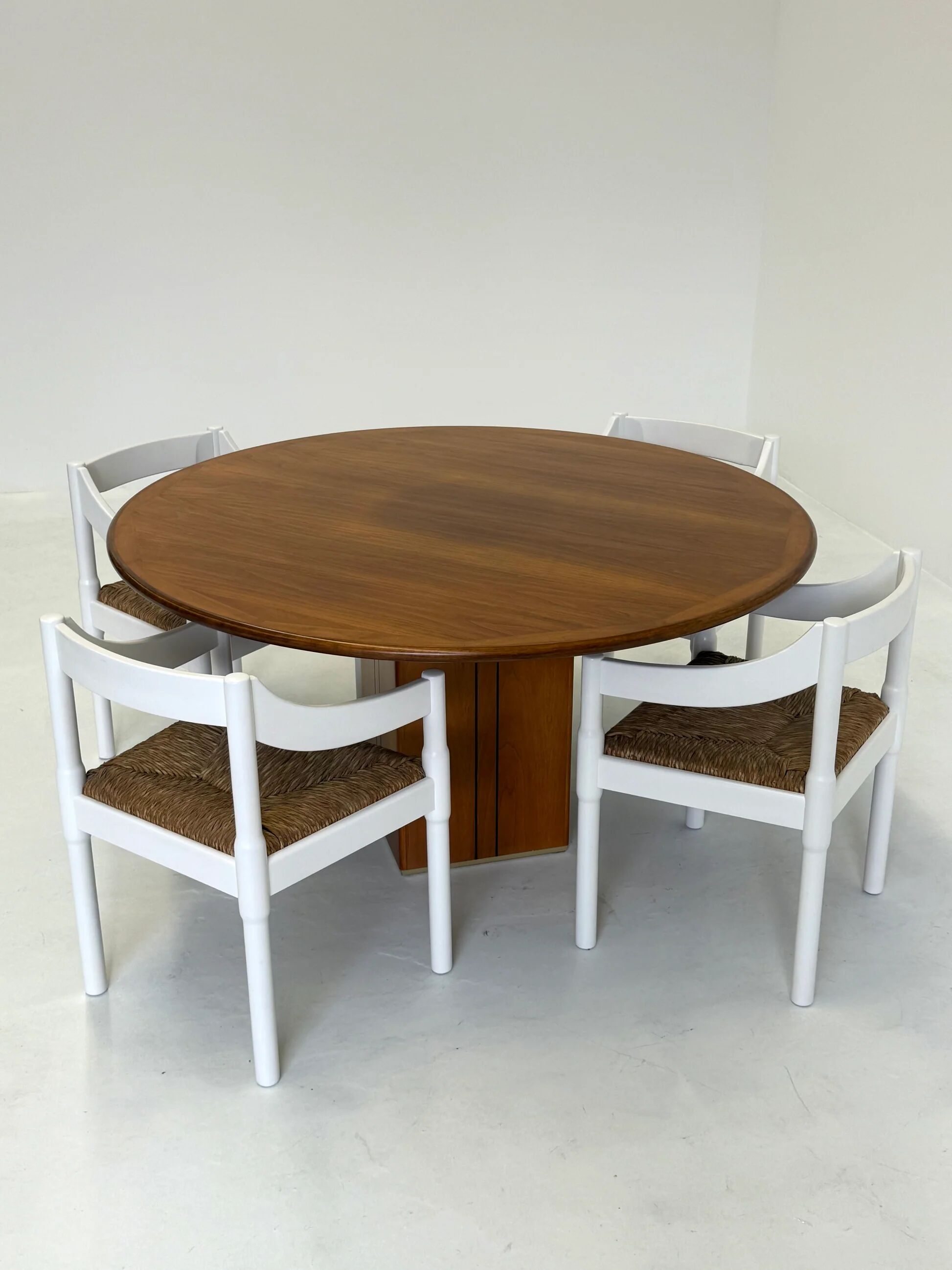 Set of two Carimate chairs by Vico Magistretti in white