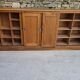 Oak workshop furniture with sliding doors.