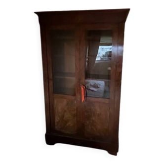 Wooden bookcase with glass doors