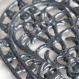 Vintage black cast iron oval trivet - Openwork design