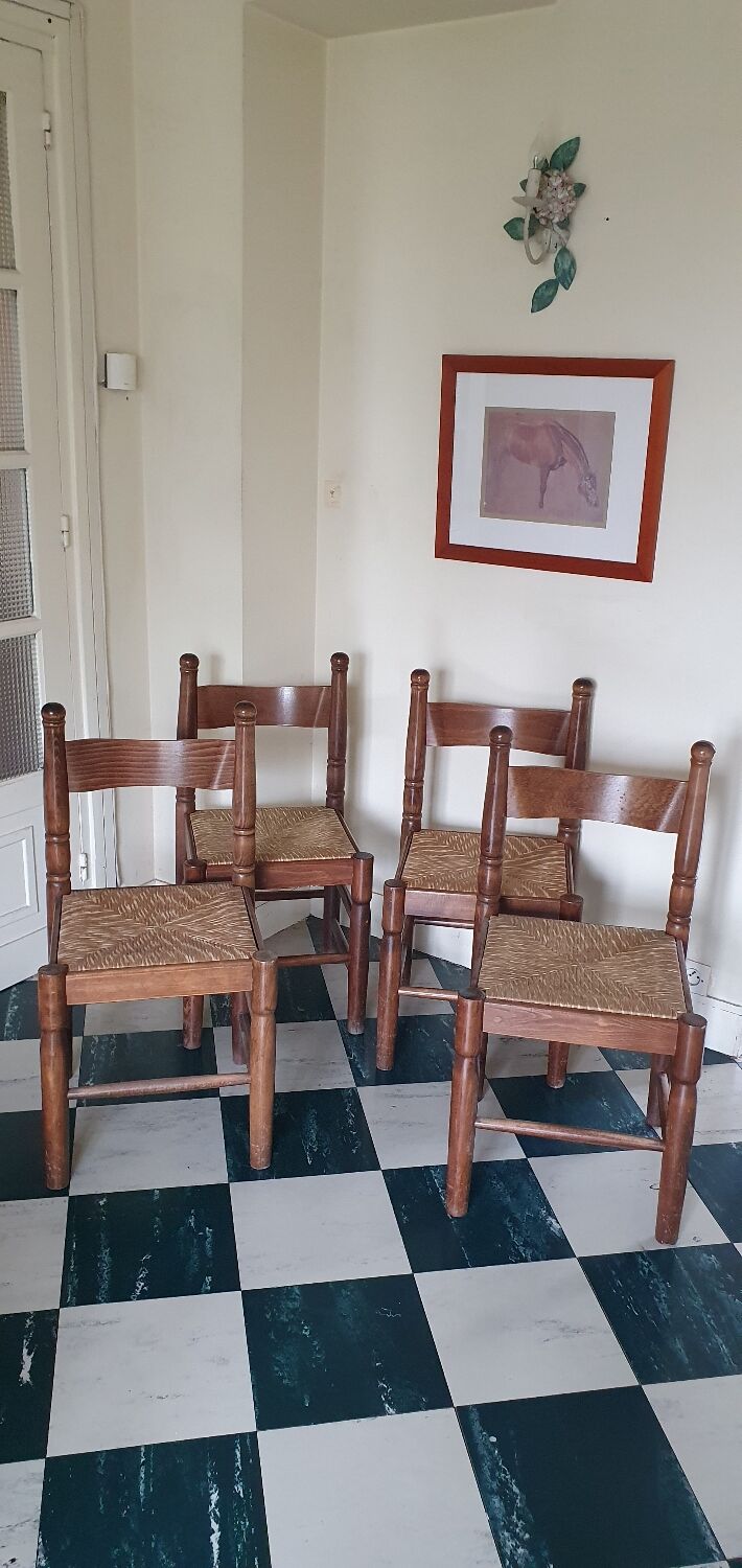 Set of 4 solid wood chairs with rush seating.