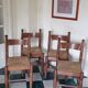 Set of 4 solid wood chairs with rush seating.