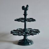 Old enameled cast iron egg display.
