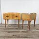 Mid-century nightstands in maple, brass, and glass