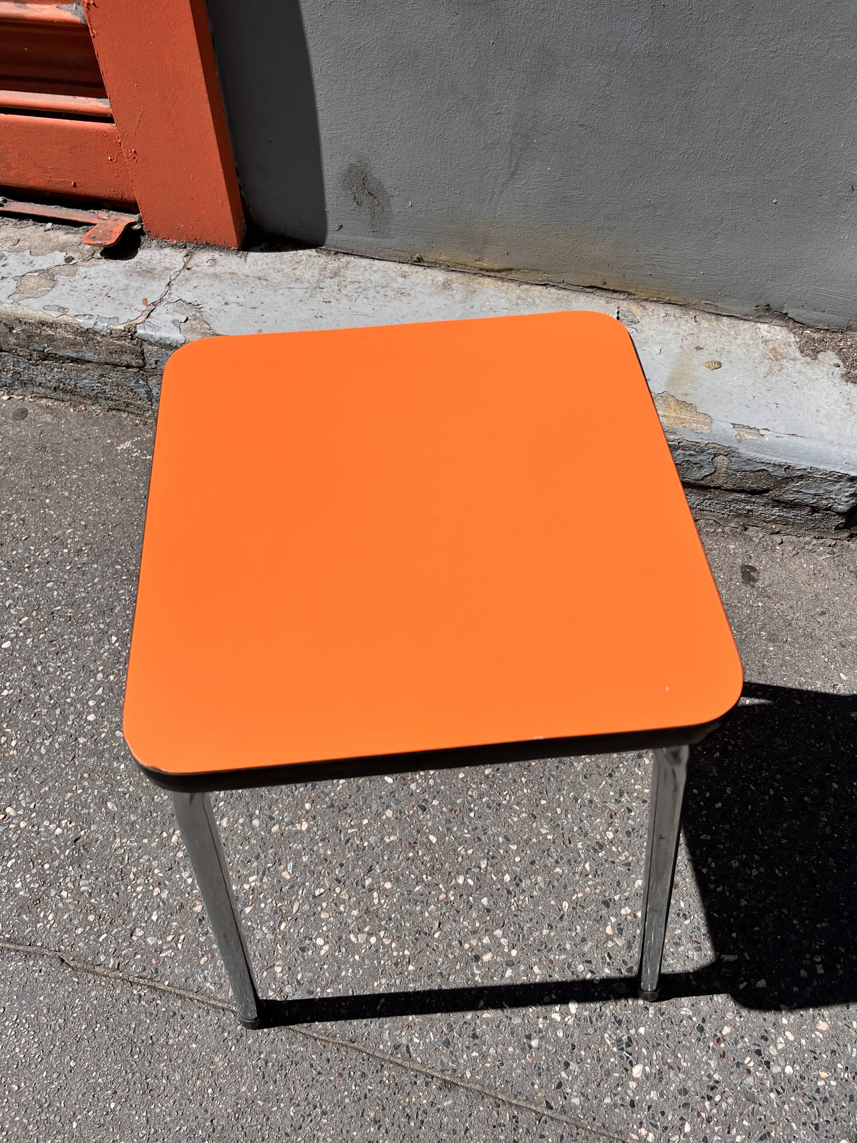 Orange Formica stool