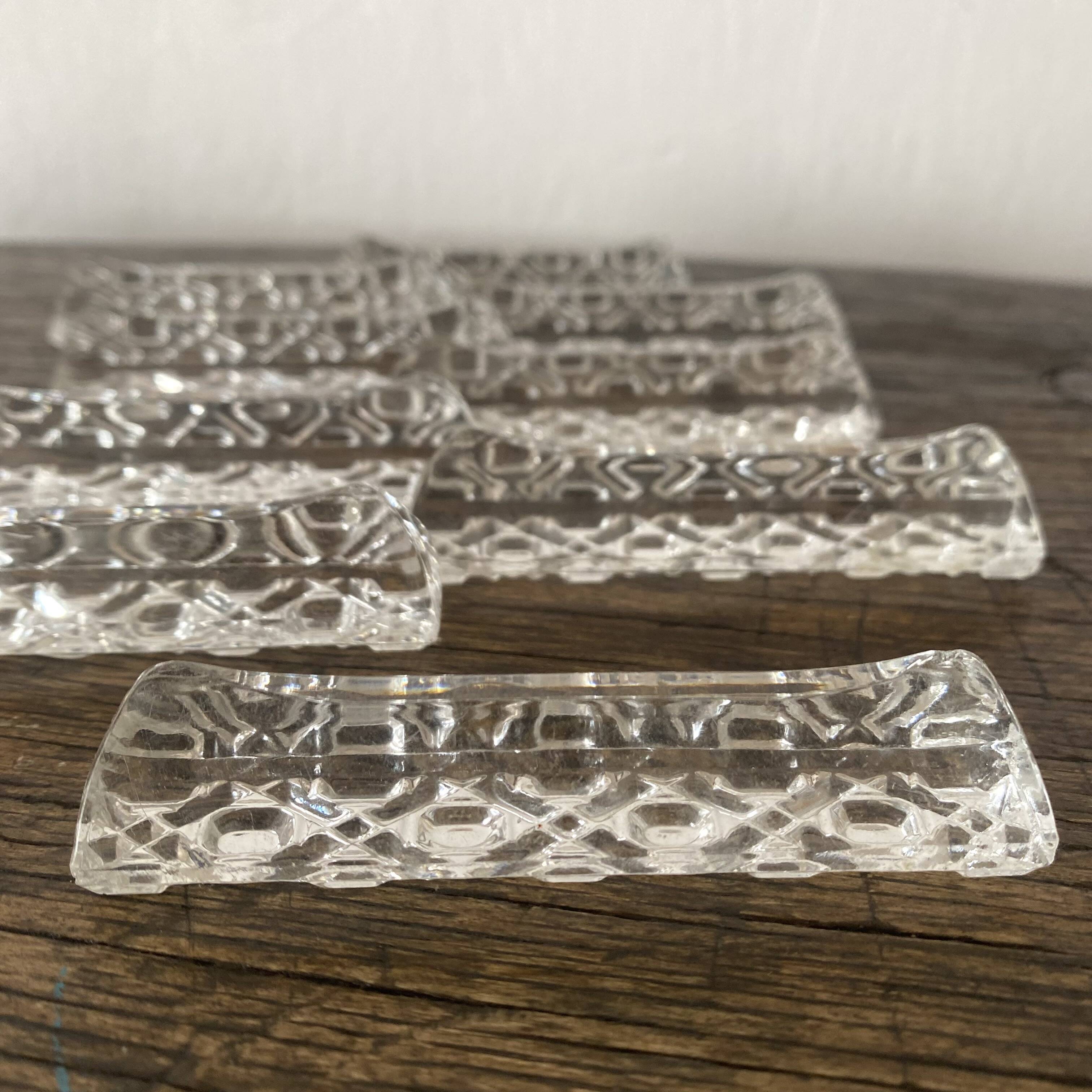 Set of antique glass knife holders