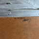 Large antique baroque mirror with angel decorations.