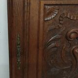 Paire d'anciennes portes en bois chêne sculpté