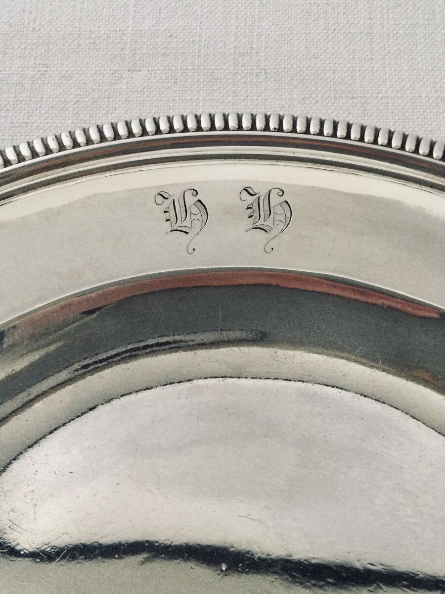 Solid silver dish with old man