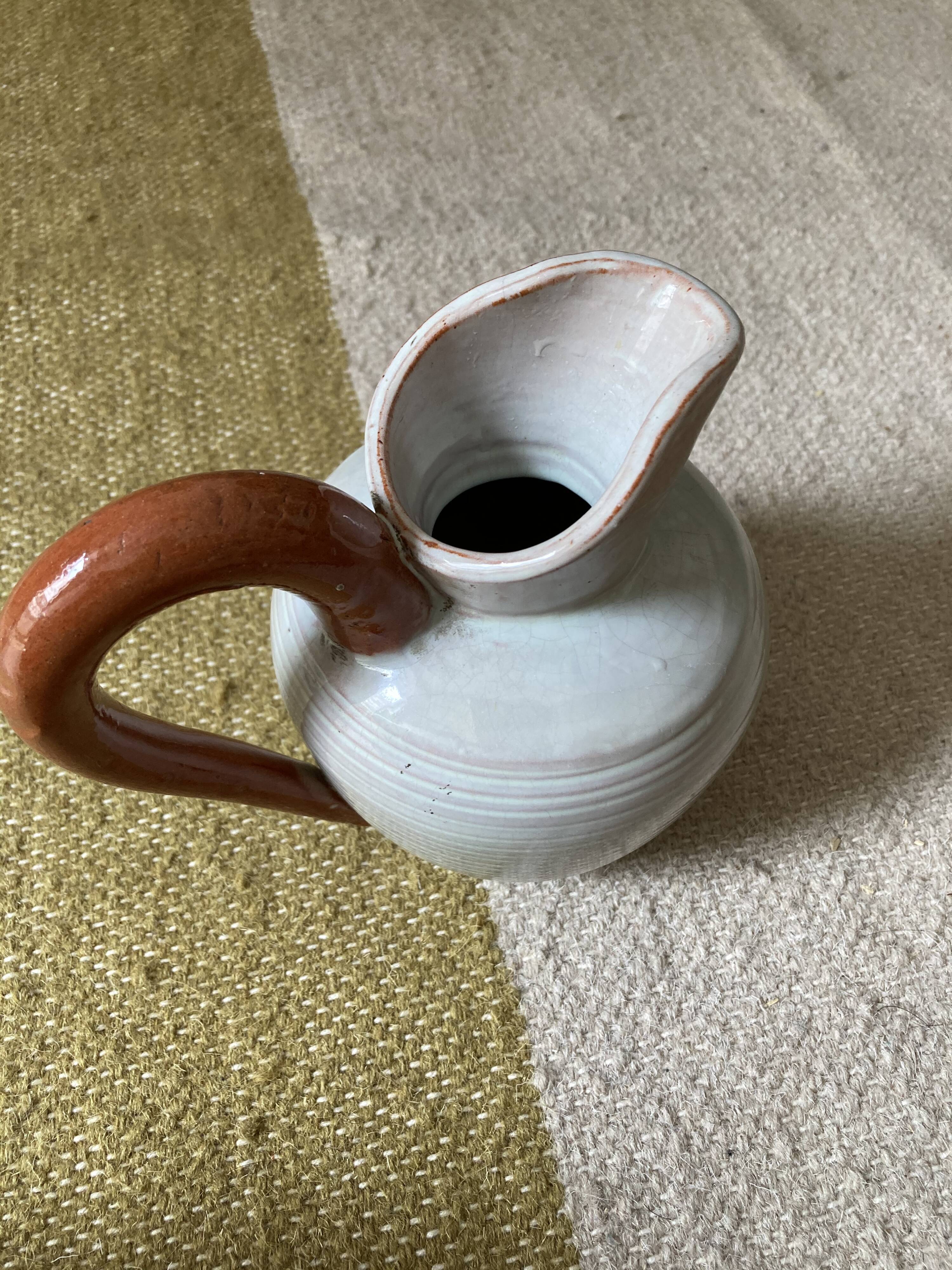 Small pitcher in sandstone