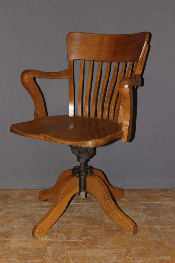 Rotating oak office chair circa 1930