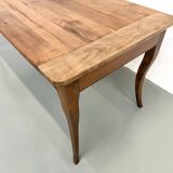 Farm table in solid cherry — Saber legs, Circa 1880