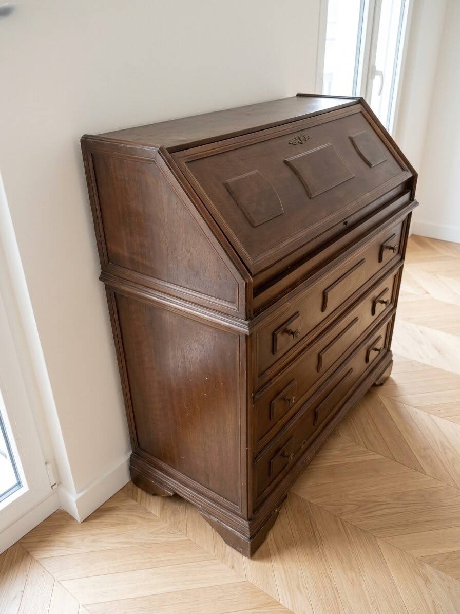 Antique wooden secretary with a drop-down front and drawers.