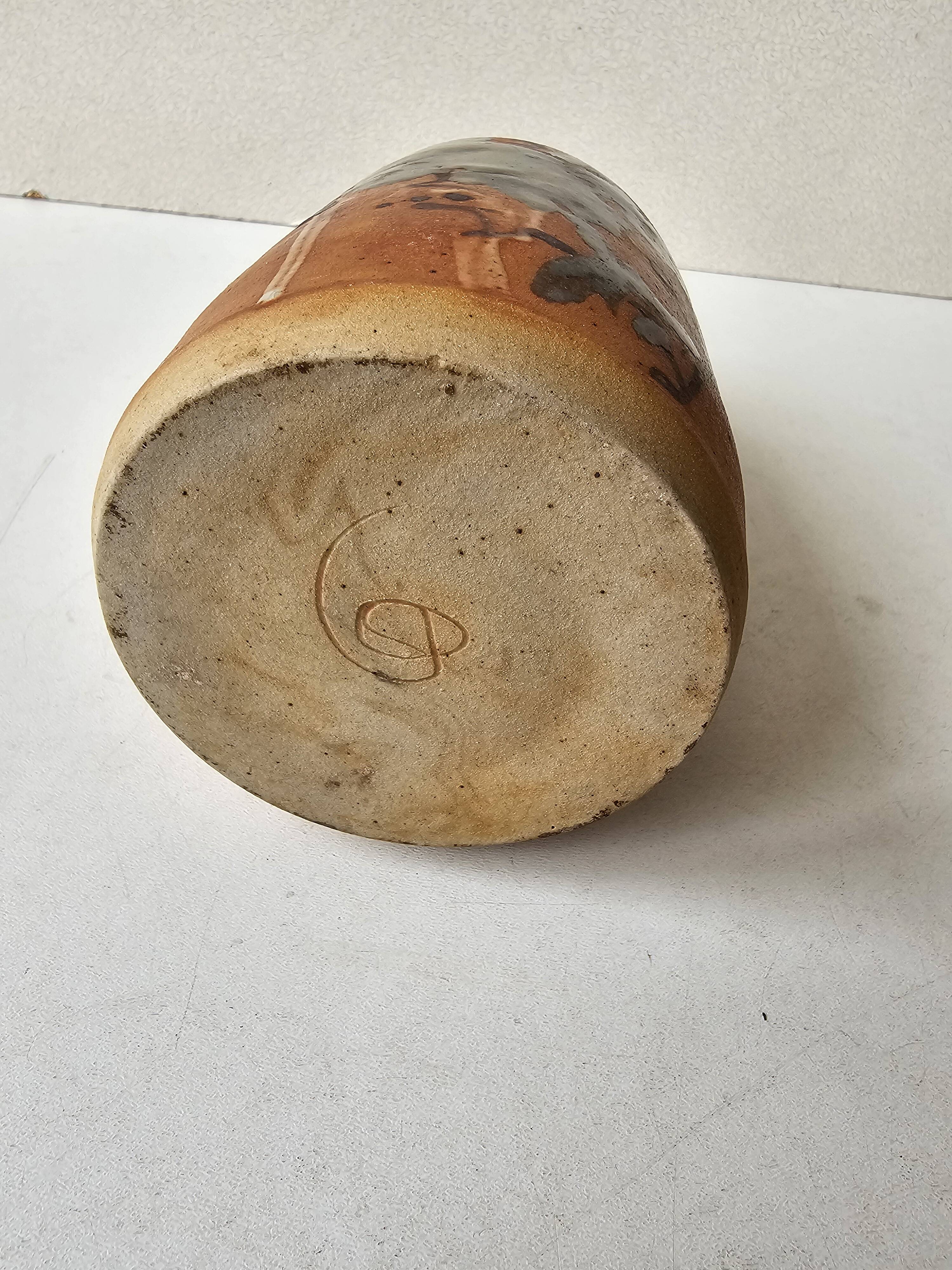 Ceramic handle soliflore vase with an unidentified signature