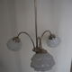 Suspension with 3 brass lights and a white glass globe from the 1950s-1960s.