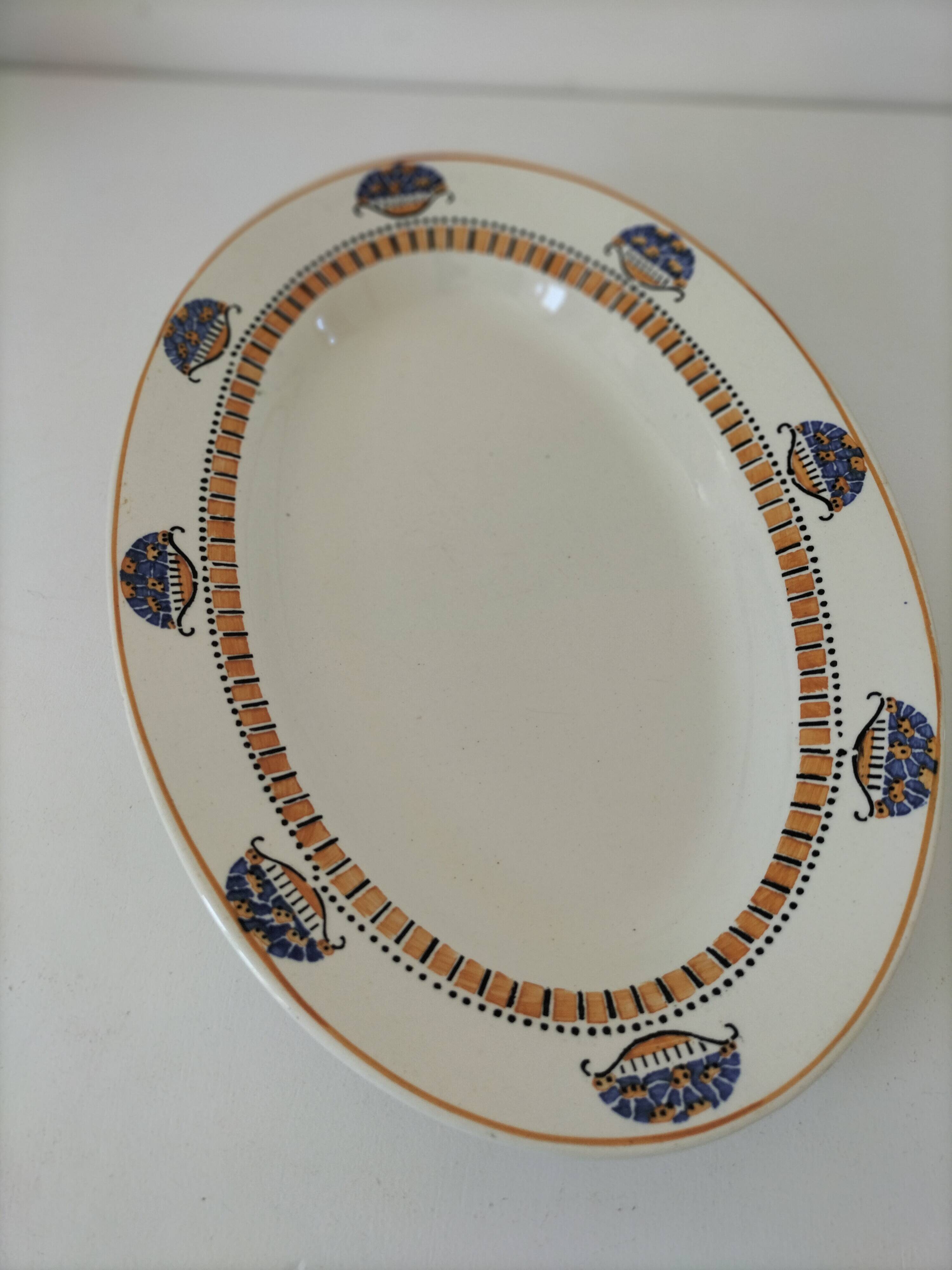 Oval Art Deco plate from Longwy pottery.