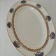 Oval Art Deco plate from Longwy pottery.