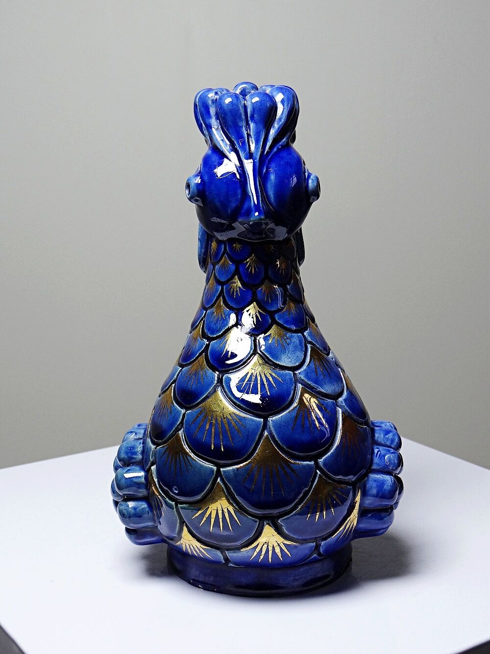 Pair of ceramic glazed candlesticks in the shape of roosters, signed A.G Roger, year 1948.