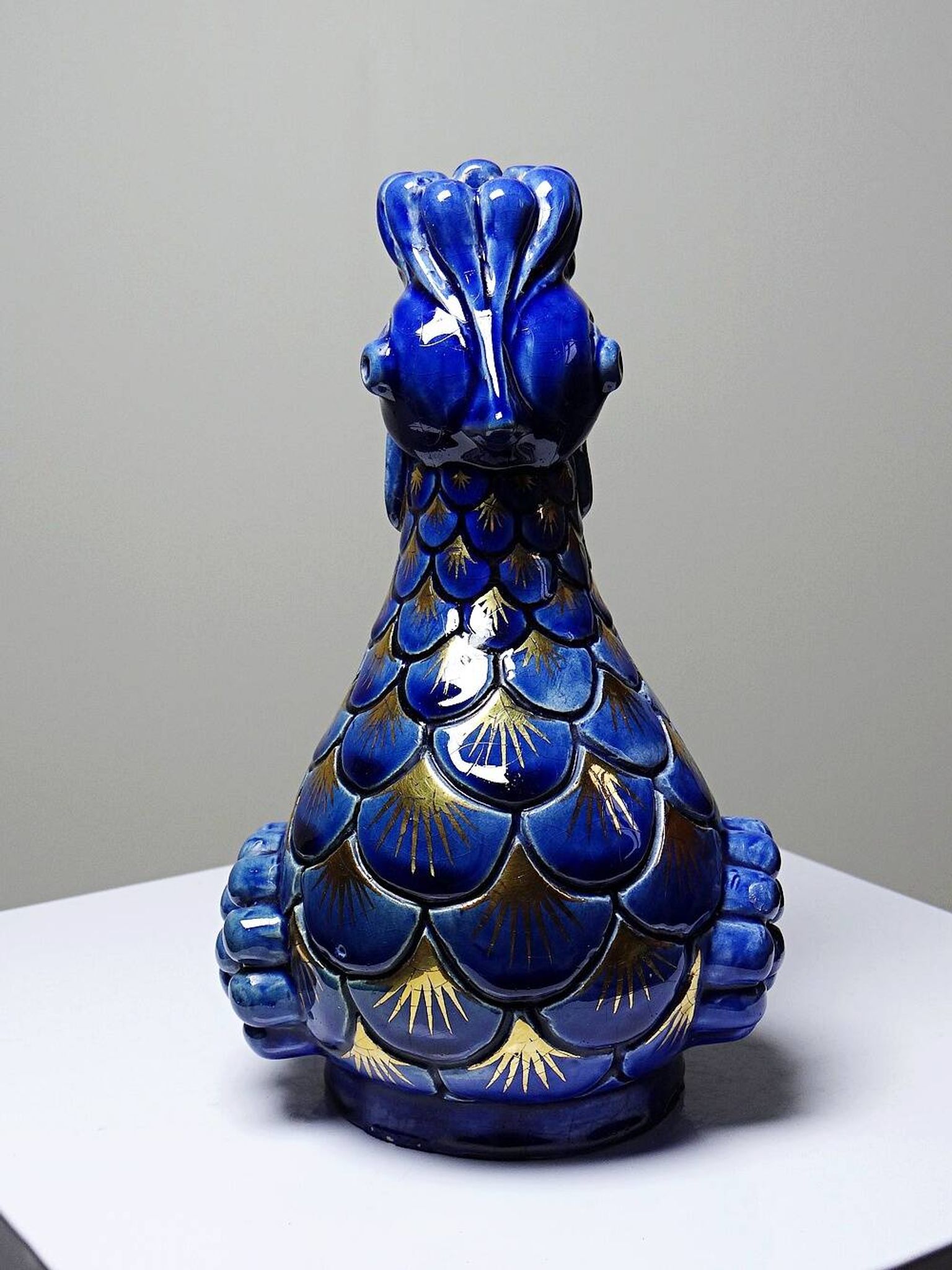 Pair of ceramic glazed candlesticks in the shape of roosters, signed A.G Roger, year 1948.