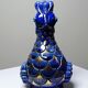 Pair of ceramic glazed candlesticks in the shape of roosters, signed A.G Roger, year 1948.