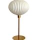 Table lamp with an antique white opaline lampshade and a vintage golden foot