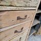 Old established a door and five drawers raw wood