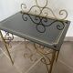 Vintage gilded metal side table, glazed ceramic trays