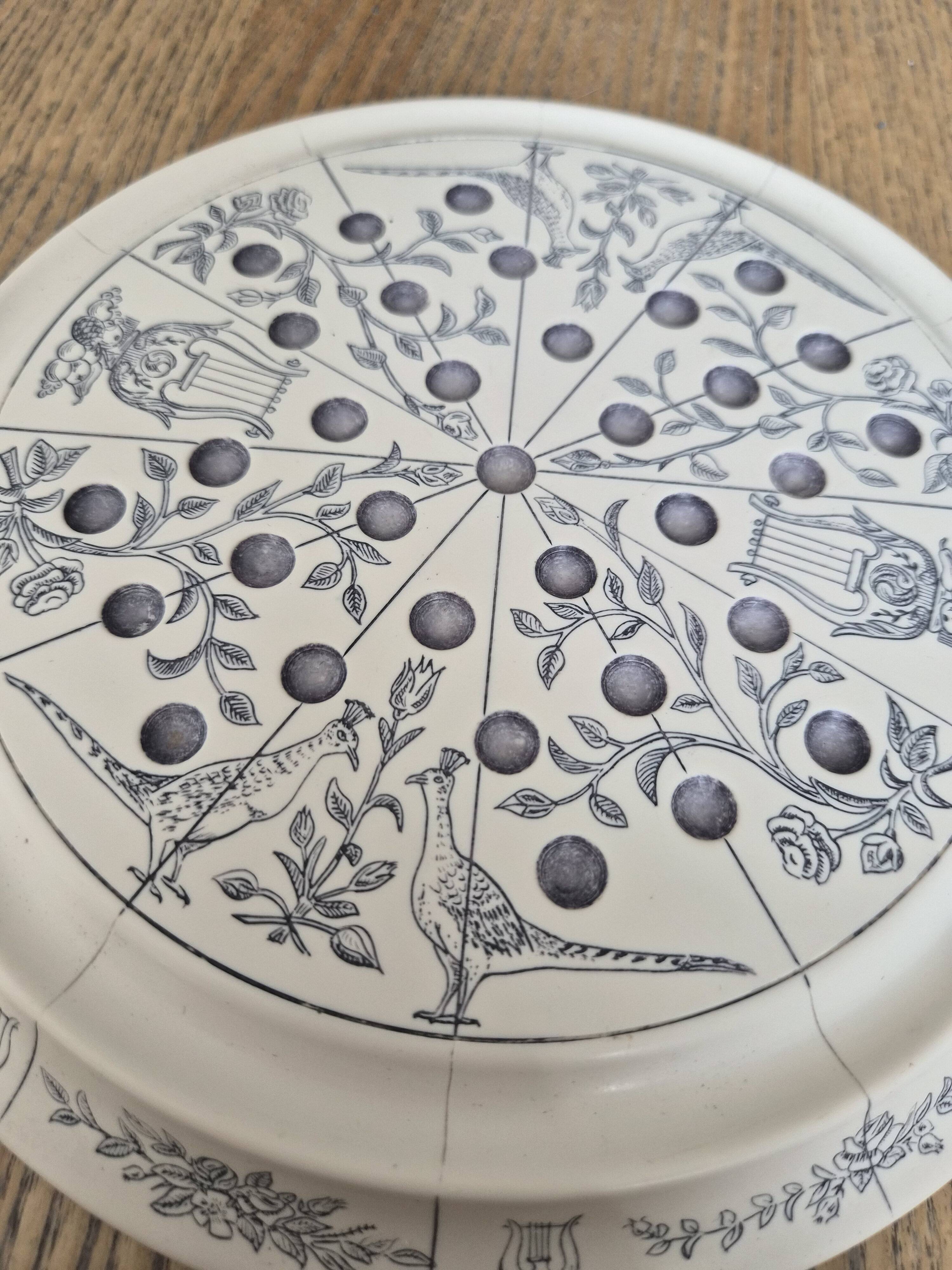 Ceramic solitaire game
