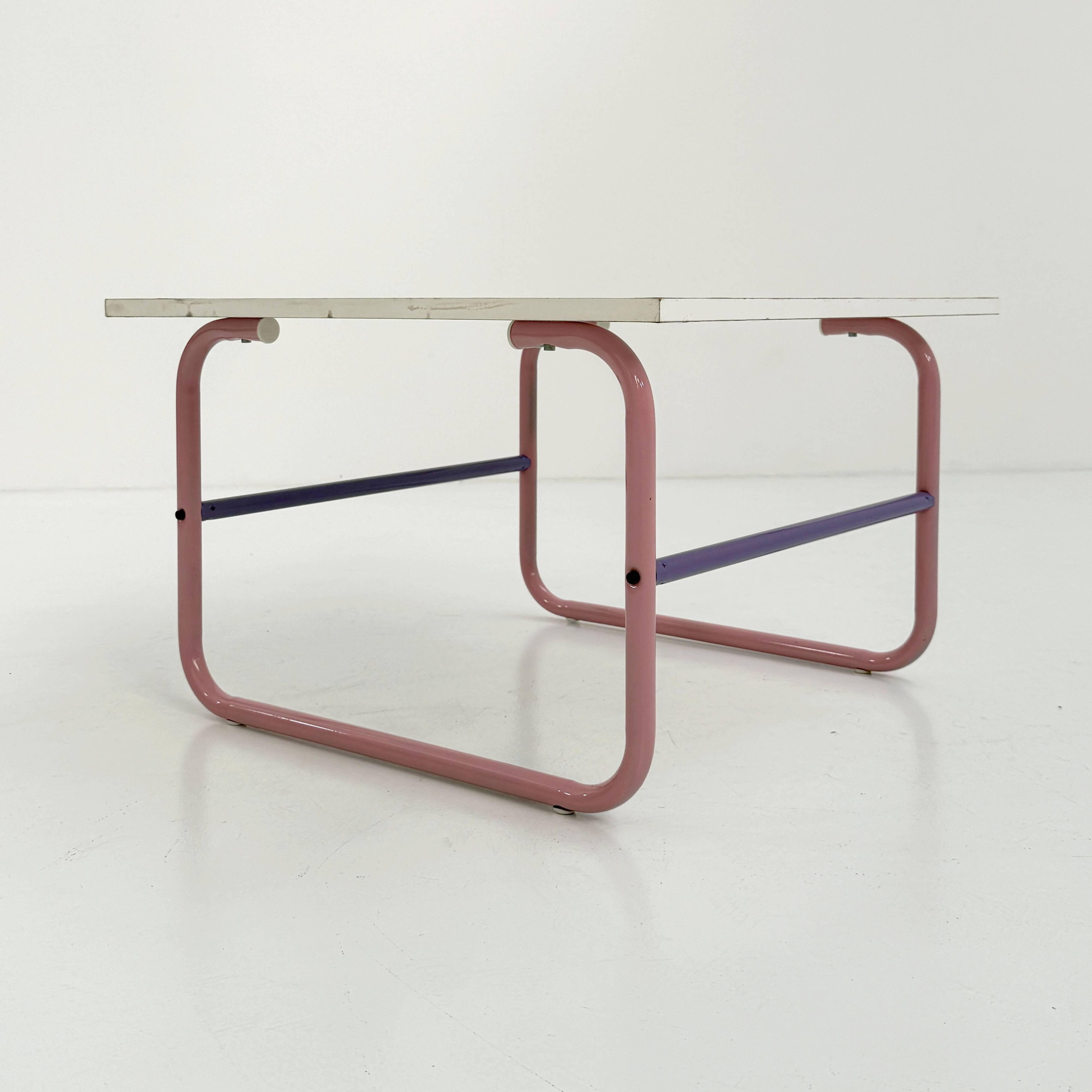 Pink and mauve tubular coffee table, 1980