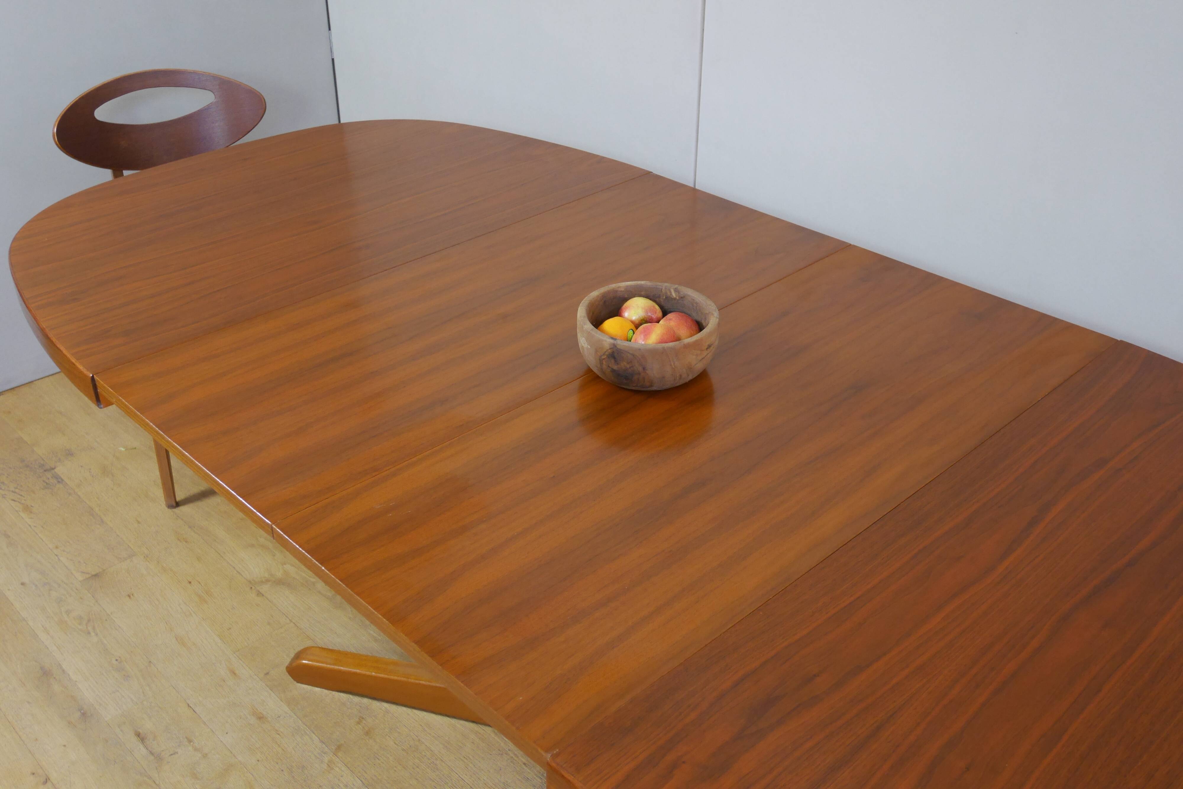 Baumann oval teak table with extensions