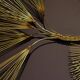 Large wall sculpture in the shape of a tree needle in brass by Curtis Jeré, mid-century modern.