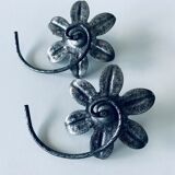 Pair of iron water lily candle holders