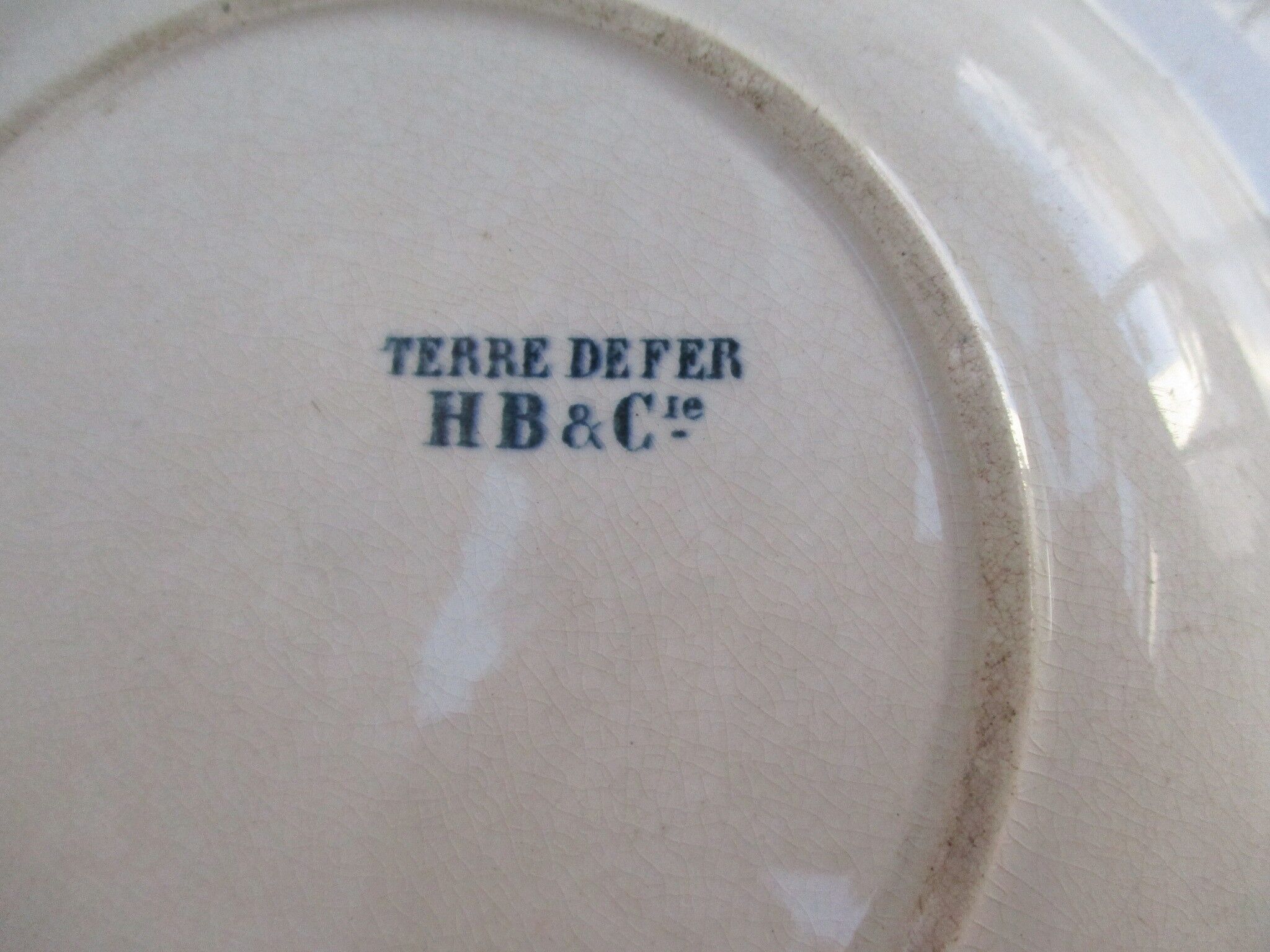 Iron earth H.B and Co. plate