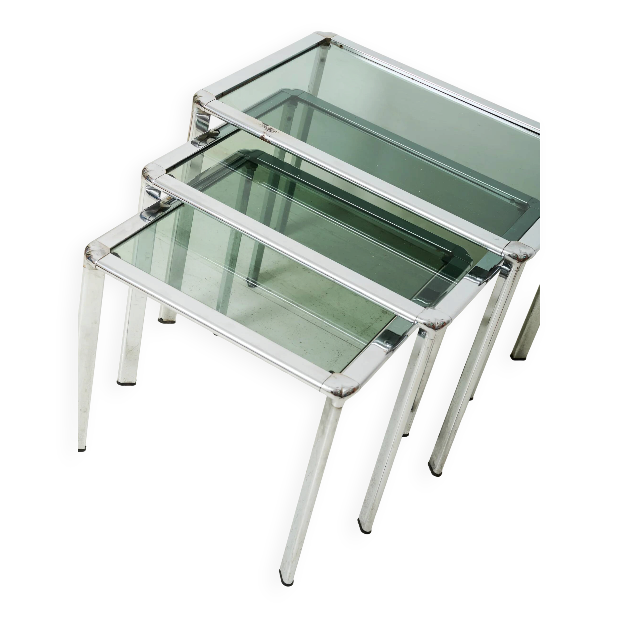 Nest tables in chrome and smoked glass, Italy, 1970s.