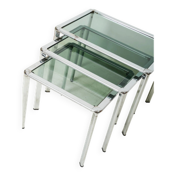 Nest tables in chrome and smoked glass, Italy, 1970s.