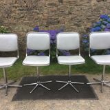 Vintage swivel chairs with chrome tubular base and silver skaï brand unic desing.