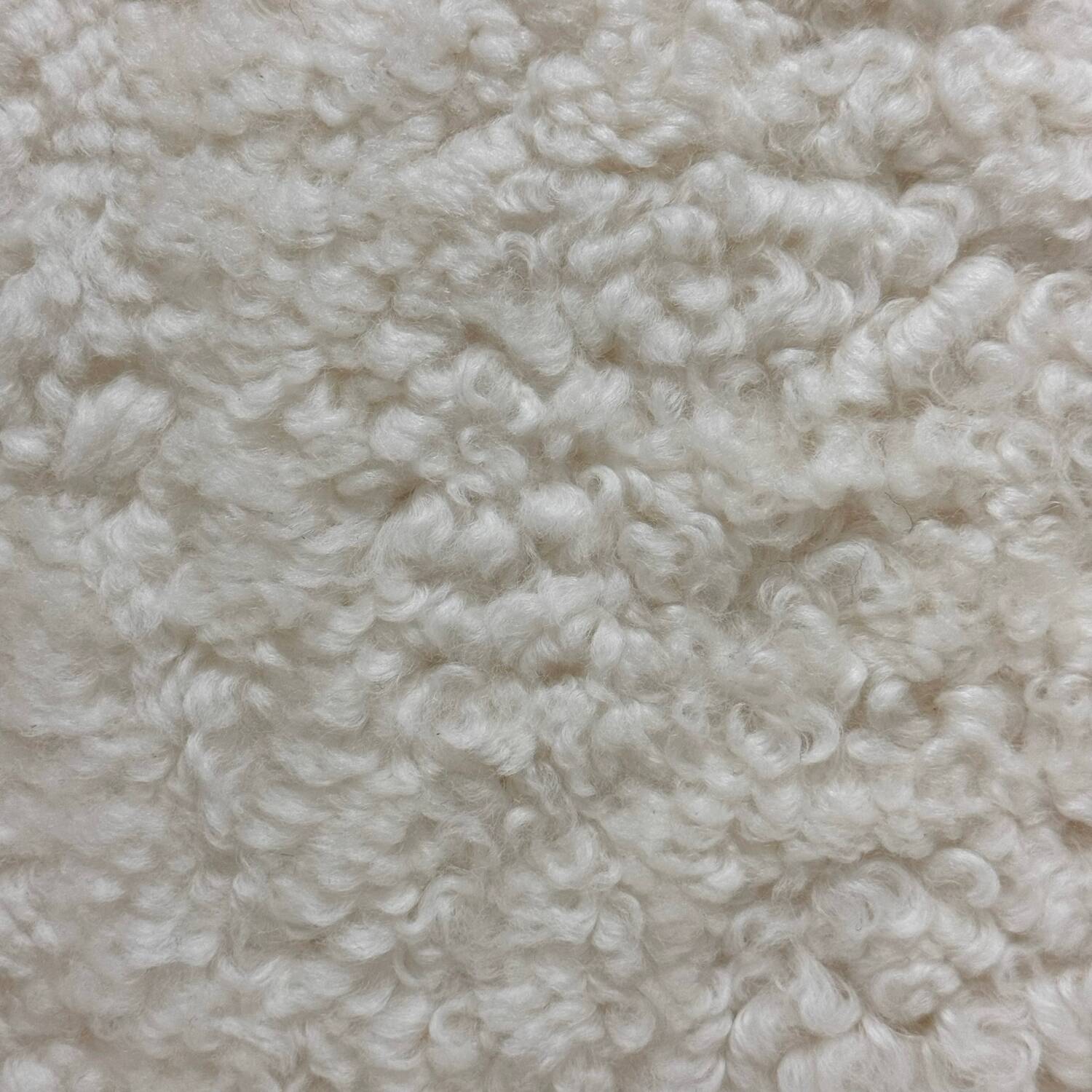 Danish lounge chair with new curly fur upholstery