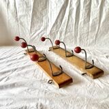 Pair of vintage wooden wall coat racks with three red ball hooks