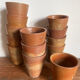 13 tasses à café en grès