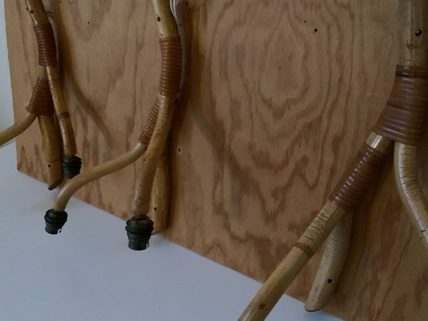 Rattan wall light trio