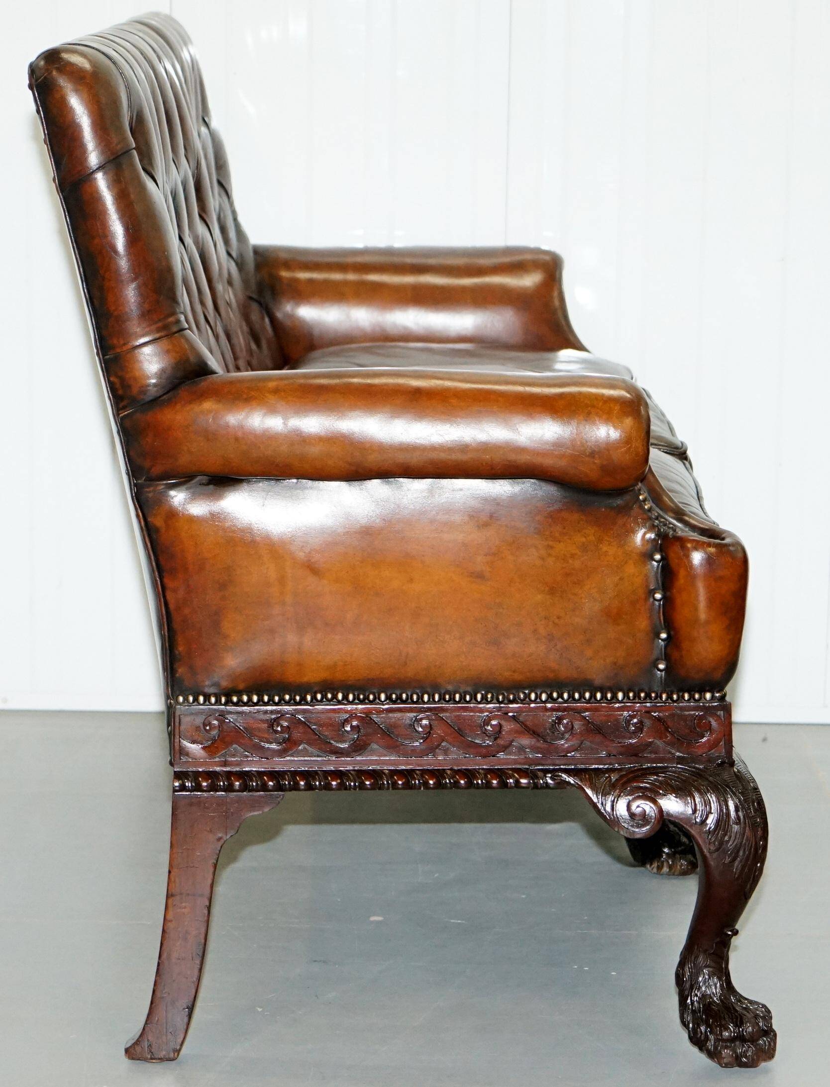 Chesterfield leather canapé in Georgian style with lion paw carved feet.