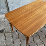 Extendable teak dining table