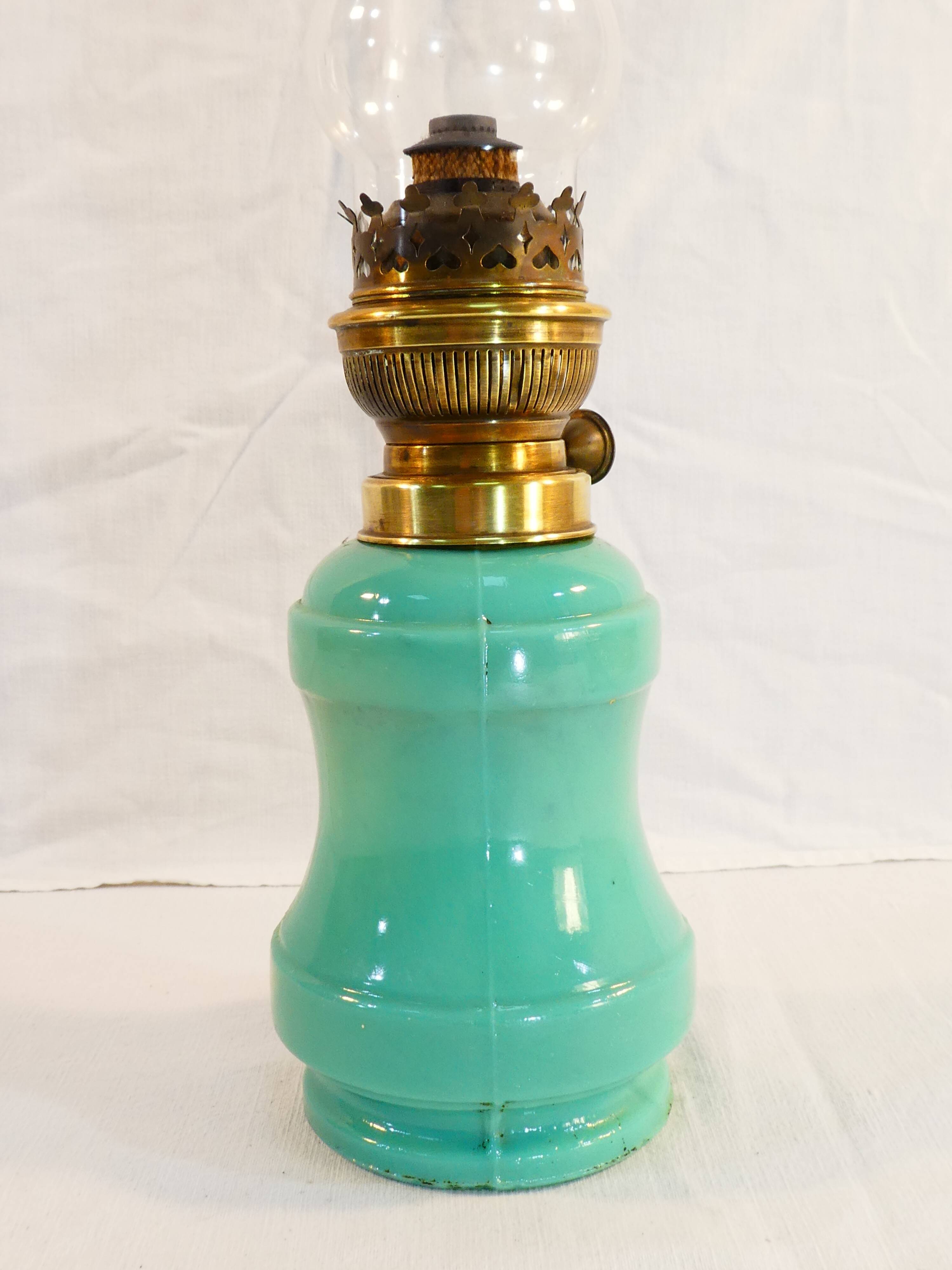 Ancient lampe a petrole in green opaline