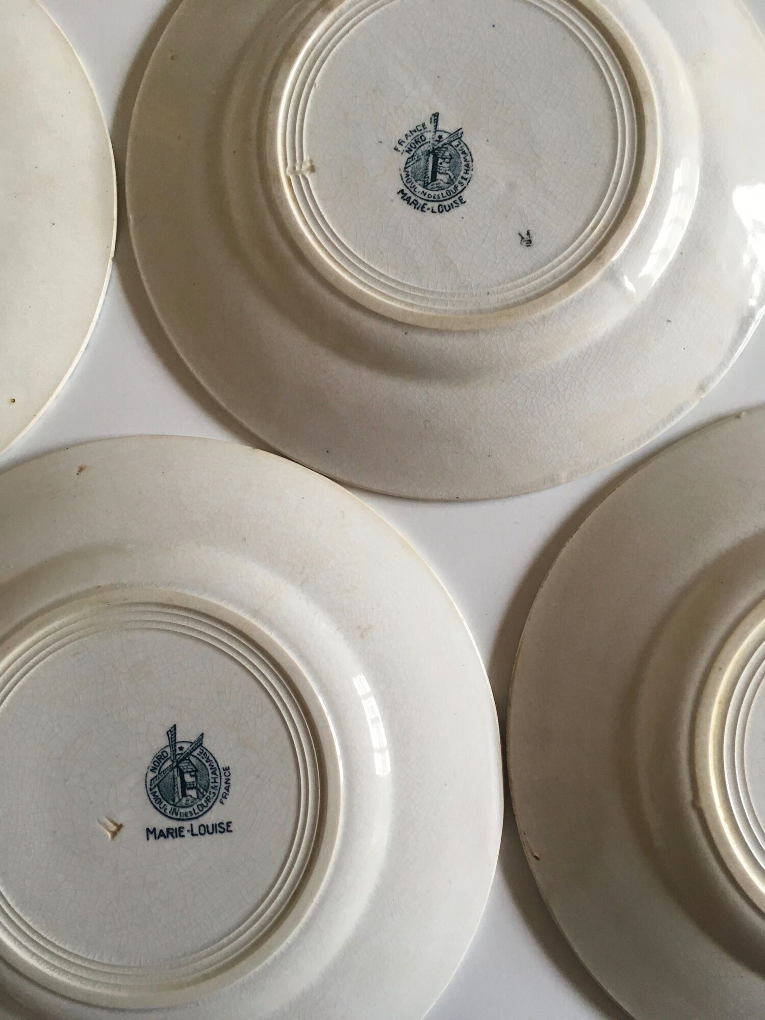 Set de 8 assiettes en faïence terre de fer Marie-Louise 1920s